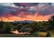 Scenic view of mountain range reflected in calm pond at 6780 Allison St, Arvada, CO 80004