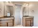 Bathroom boasts dual sinks, granite counters, and updated lighting at 1839 Grove St, Denver, CO 80204