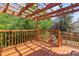 Outdoor deck with a decorative pergola and string lighting at 19937 E Loyola Pl, Aurora, CO 80013
