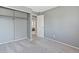 Empty bedroom with a closet and doorway at 19937 E Loyola Pl, Aurora, CO 80013