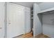 Functional entryway with a closet and storage shelves for a clean, organized space at 19937 E Loyola Pl, Aurora, CO 80013