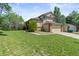A two-story home features a brick-and-siding exterior and a two car garage at 19937 E Loyola Pl, Aurora, CO 80013