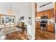 Inviting dining space with hardwood floors and an open layout, perfect for entertaining at 11899 Elizabeth Cir, Thornton, CO 80233