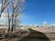 Scenic frost covered path winds through the neighborhood at 11899 Elizabeth Cir, Thornton, CO 80233