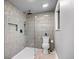 Modern bathroom with tiled walk-in shower, and contemporary fixtures at 8750 W 8Th Ave, Lakewood, CO 80215