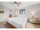 Bright bedroom with hardwood floors, and en-suite bathroom at 8750 W 8Th Ave, Lakewood, CO 80215
