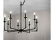 Close up view of a stylish and modern, black ten-bulb chandelier at 8750 W 8Th Ave, Lakewood, CO 80215