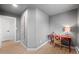 Cozy home office space with red desk and natural light at 8750 W 8Th Ave, Lakewood, CO 80215