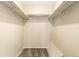 An empty walk-in closet at 1250 S Monaco Pkwy # 67, Denver, CO 80224