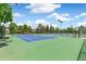 Multiple tennis courts offer ample space for matches, set within lush green surroundings at 1250 S Monaco Pkwy # 67, Denver, CO 80224
