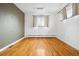 Spacious bedroom with hardwood floors, ample natural light, and neutral wall colors at 2930 S Birch St, Denver, CO 80222