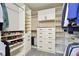 Organized walk-in closet featuring custom shelving, drawers, and hanging space for efficient storage at 3493 Princeton Pl, Broomfield, CO 80023