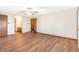 Spacious bedroom with laminate flooring and neutral walls at 14091 W Exposition Dr, Lakewood, CO 80228