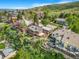 Exterior elevation showcasing a multi-level deck, landscaping and privacy, perfect for outdoor living and entertaining at 14091 W Exposition Dr, Lakewood, CO 80228