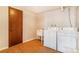 Laundry room with included washer, dryer, and sink at 14091 W Exposition Dr, Lakewood, CO 80228