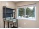 Utility sink with shelving and a large window at 17720 Canterbury Dr, Monument, CO 80132