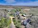 Scenic aerial view of the expansive ranch estate and surrounding countryside at 9445 Lykins Pl, Longmont, CO 80503