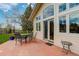 Charming back patio area featuring stone flooring and outdoor seating, perfect for relaxation at 9445 Lykins Pl, Longmont, CO 80503