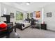 Comfortable bedroom featuring a desk, bed, and natural light at 2564 S Carey Way, Denver, CO 80222