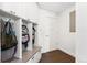 Mudroom featuring white cubbies for storage and a bench at 2564 S Carey Way, Denver, CO 80222