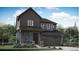 Charming two-story home with a gray exterior, a covered front porch, and a two-car garage at 12626 W Frost Ave, Littleton, CO 80127