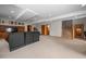Finished basement with a media center and recreational space, ideal for entertainment at 1423 Belford Ct, Evergreen, CO 80439