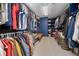 Spacious walk-in closet with ample storage and organization, perfect for any wardrobe at 1423 Belford Ct, Evergreen, CO 80439