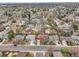Charming neighborhood aerial view featuring well-maintained homes with mature trees and green spaces at 14867 E Harvard Ave, Aurora, CO 80014