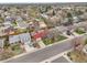 Aerial view captures this neighborhood's cozy homes, each with a garage and tree-lined streets at 14867 E Harvard Ave, Aurora, CO 80014