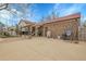 Large backyard patio perfect for entertaining, featuring a brick home exterior at 14867 E Harvard Ave, Aurora, CO 80014