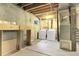 Unfinished basement featuring a clean, bright space with visible utilities, and lots of storage at 14867 E Harvard Ave, Aurora, CO 80014