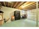 Spacious basement with an area for storage and open space, with visible ceiling beams at 14867 E Harvard Ave, Aurora, CO 80014