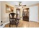 Dining room with wooden table, chairs, and decorative wall art at 14867 E Harvard Ave, Aurora, CO 80014