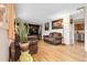 Inviting living room with hardwood floors, stylish furnishings, and ample natural light at 14867 E Harvard Ave, Aurora, CO 80014