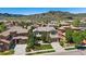 Beautiful aerial view of a two-story home nestled in a lush suburban neighborhood with scenic mountain backdrop at 2263 S Loveland St, Lakewood, CO 80228