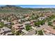 Stunning aerial view of a neighborhood with lush greenery and mountain views at 2263 S Loveland St, Lakewood, CO 80228