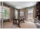 Cozy office with natural light, a modern desk, and custom built-in bookshelves at 2263 S Loveland St, Lakewood, CO 80228