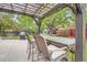 Charming backyard with wooden pergola, outdoor grill, and garden shed at 11864 N Chase Ct, Westminster, CO 80020