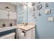 Unique, nautical-themed bathroom features sea-inspired decorations and built-in storage at 11864 N Chase Ct, Westminster, CO 80020