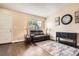 Inviting living room with hardwood floors, natural light and modern furnishings and decor at 11864 N Chase Ct, Westminster, CO 80020