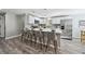 Modern kitchen features sleek stainless steel appliances, ample countertop space, and stylish seating at 1390 Everett Ct # 105, Lakewood, CO 80215