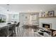 Cozy living room with fireplace, stylish furniture and decor at 1390 Everett Ct # 105, Lakewood, CO 80215