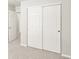 Bedroom closet with sliding panel doors provides ample storage and convenience at 764 N Tempe St, Aurora, CO 80018