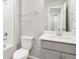 Full bathroom featuring a tub, toilet and single sink vanity at 764 N Tempe St, Aurora, CO 80018