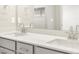 Bathroom featuring a double vanity with modern fixtures and a large mirror at 764 N Tempe St, Aurora, CO 80018