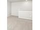 Neutral bedroom with light walls, carpet flooring, and a half-wall at 764 N Tempe St, Aurora, CO 80018