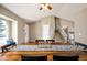 View of the dining room showcasing an expansive table, with an open floorplan and staircase at 200 N Holcomb St, Castle Rock, CO 80104