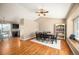 The dining room has hardwood floors, open design, and lots of natural light with a seamless transition to the kitchen at 200 N Holcomb St, Castle Rock, CO 80104