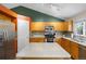 Contemporary kitchen featuring stainless steel appliances, a central island, and ample counter space at 20858 E Progress Ave, Centennial, CO 80015