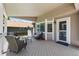 Covered patio with stylish outdoor furniture and a view of the backyard at 20858 E Progress Ave, Centennial, CO 80015
